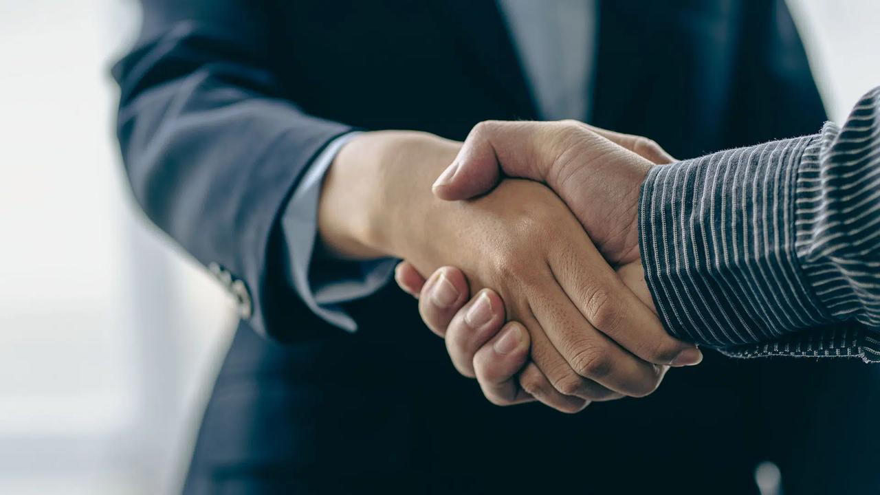 Woman teaching with laptop